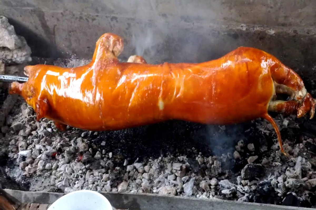 Grilled skewers of dwarf pig meat in Ha Giang countryside market